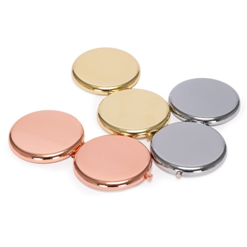 Espejo metálico doble con aumento 